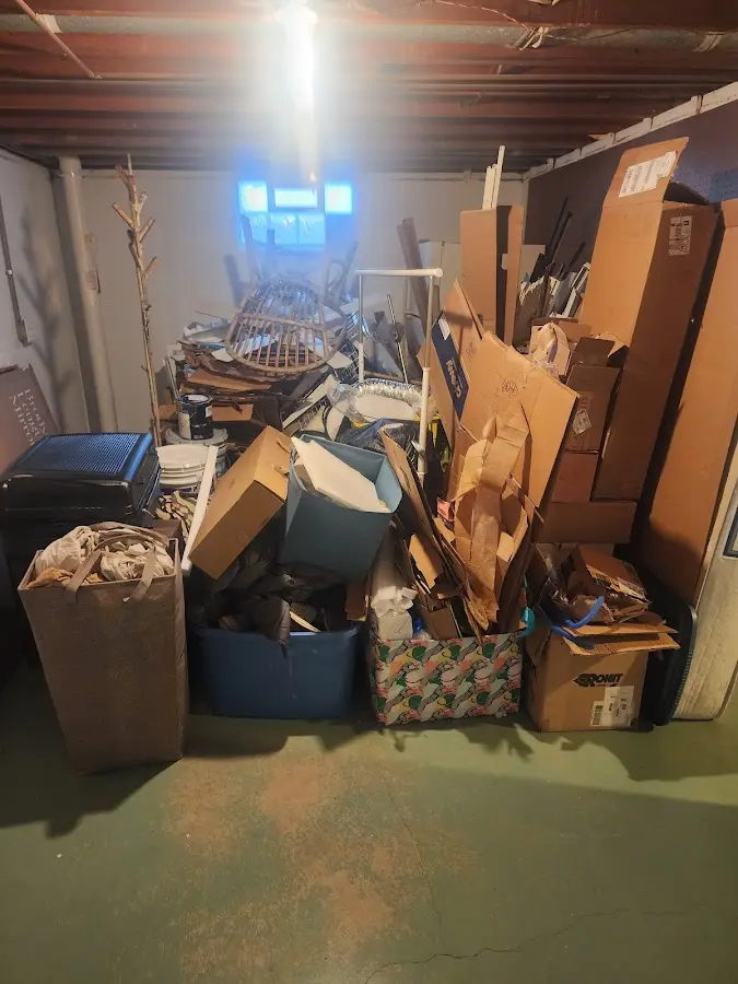 Roll-off dumpster container at job site for 20 Yard Dumpster Rental in Hadley